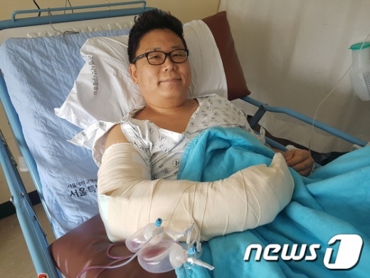 낙성대 의인. 사진은 낙성대 의인 곽경배씨가 카메라를 보고 웃고 있다. /사진=뉴스1
