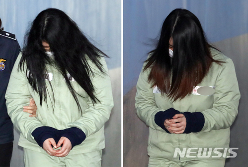 '인천 초등생 살인' 혐의로 구속기소된 피고인 박모씨와 김모양이 머리카락을 풀어헤쳐 얼굴을 가린 채 지난 4월30일 오후 항소심 선고 공판을 받기 위해 서울고등법원으로 출석하고 있다. /사진=뉴시스