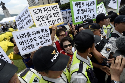 세월호 추모 반대 기자회견을 촬영하던 시민에게 욕을 한 혐의로 재판에 넘겨진 60대 여성에게 법원이 무죄를 선고했다. /사진=뉴스1