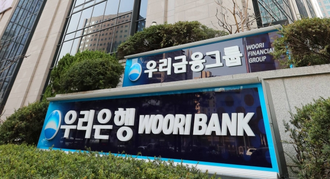 금융감독원이 손태승 우리금융지주 회장에 대한 중징계를 취소하라는 법원의 1심 판결에 불복해 항소를 결정한 가운데 우리금융의 연내 '완전민영화'에 빨간불이 켜졌다./사진=우리금융