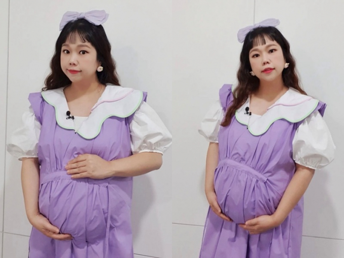 개그우먼 홍현희가 뱃속의 아이 '똥벼리'와 의상협찬을 받았다. 임부복을 입고 배를 감싼 채 카메라는 응시하는 홍현희. /사진=홍현희 인스타그램