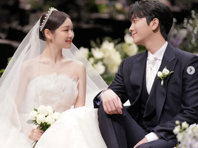 올림픽 공식 홈페이지도 '피겨여왕' 김연아의 결혼 소식에 축하메시지를 보냈다. 사진은 지난 24일 김연아가 남편 고우림과의 결혼식 사진을 올린 인스타그램 게시글. /사진=김연아 인스타그램 캡처