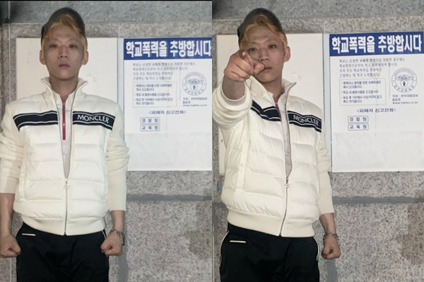 래퍼 양홍원이 '학교 폭력 방지' 포스터 앞에서 찍은 사진을 공개하자 누리꾼이 불편한 기색을 드러냈다. /사진=양홍원 인스타그램