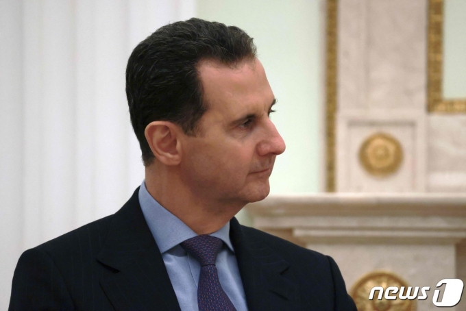 바샤르 알아사드 시리아 대통령이 15일(현지시간) 모스크바 크렘린에서 블라디미르 푸틴 러시아 대통령과 정상회담서 