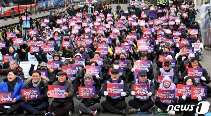 [사진] 이태원 참사 특별법 공포 촉구 대회 구호