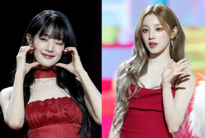 걸그룹 (여자)아이들의 멤버 민니와 우기가 발열 증상 및 편두통 호소 등 컨디션 난조로 활동을 일시 중단한다. 지난해 12월25일 '2023 SBS 가요대전' 레드카펫 행사에 참석한 민니(왼쪽)와 우기. /사진=뉴스1