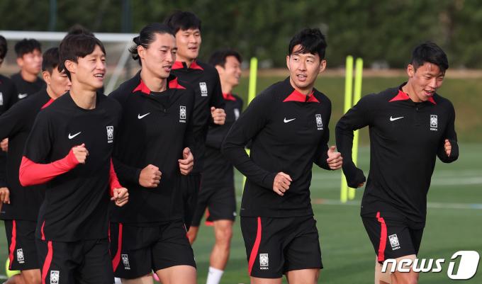 [사진] 달리는 축구대표팀