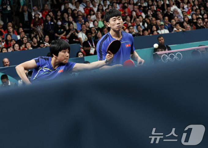 [사진] 금메달 사냥 나선 北 리종식·김금용