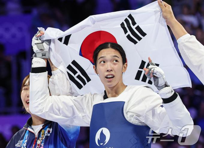 [사진] 김유진 '대한민국 13번째 금메달 주인공'