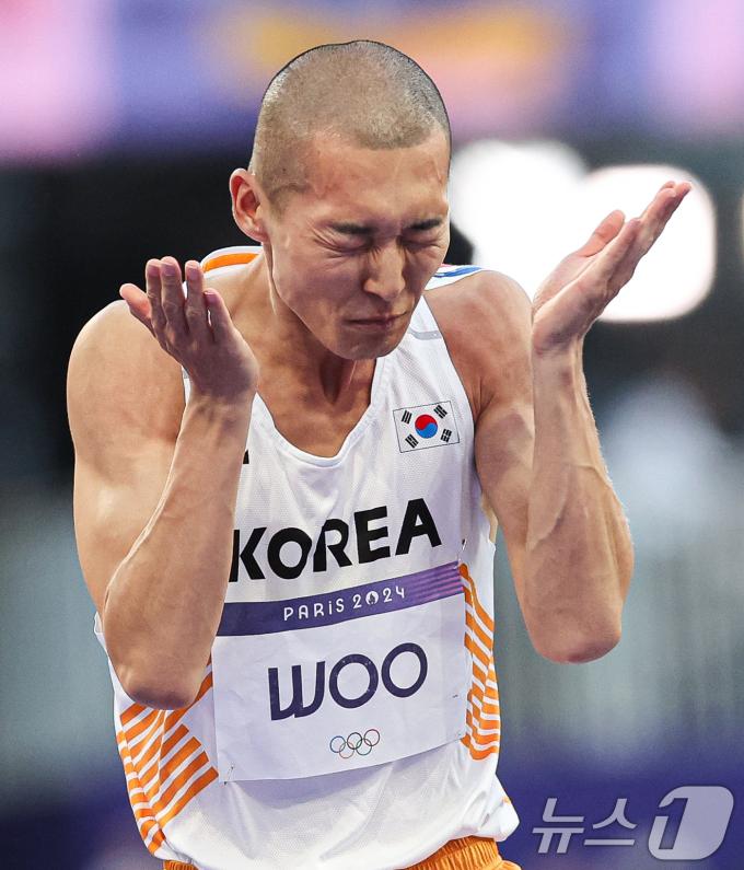 [사진] 3차시기 실패에 아쉬워하는 우상혁
