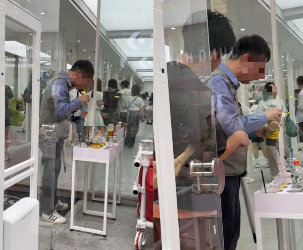 한 남성이 서울 명동의 한 매장 앞 음료 보관대에 놓여 있는 남의 음료를 마시는 모습이 공개됐다. /사진=틱톡 영상 캡처