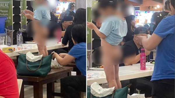 싱가포르 한 쇼핑센터 식당에서 아이 대변 기저귀를 교체한 여성이 논란이다. /사진=페이스북 갈무리
