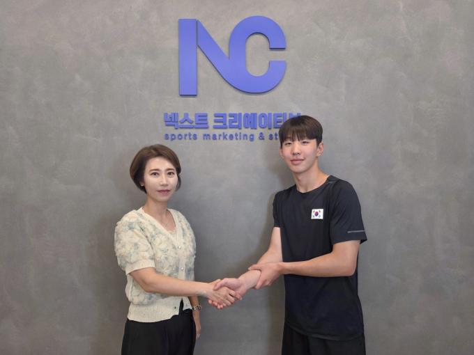 넥스트크리에이티브와 매니지먼트 계약을 맺은 철인3종 전태일(넥스트크리에이티브 제공)