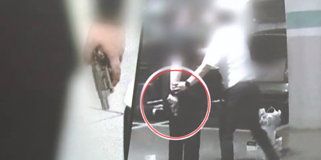 서울 양천구의 한 아파트 주차장에서 권총 모양의 가스분사기로 이웃 주민을 위협한 혐의를 받는 남성이 경찰 조사를 받고 있다. /사진=채널A 방송캡처