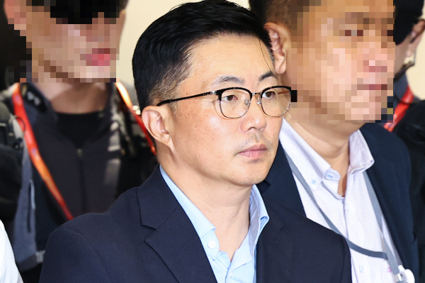 김예성씨가 김건희 특검팀에 체포됐다. '김건희 집사' 김예성씨가 12일 인천공항으로 귀국해 체포되어 김건희 특검팀(특별검사 민중기) 사무실로 압송되고 있는 모습. /사진=뉴시스