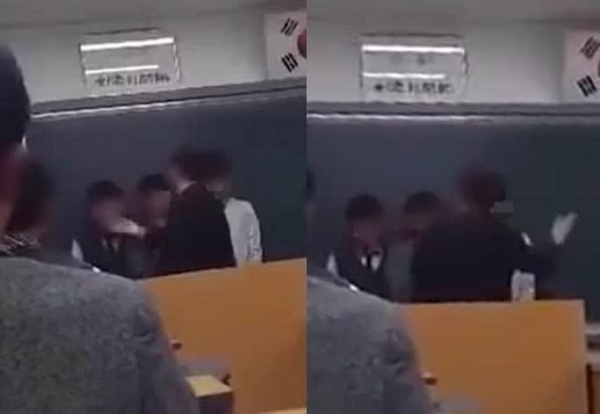 전남 여수 한 고등학교에서 교사가 학생들을 폭행하는 모습을 담은 영상이 공유됐다. 사진은 교사가 학생들의 뺨을 때리는 모습. /사진=보배드림 캡처