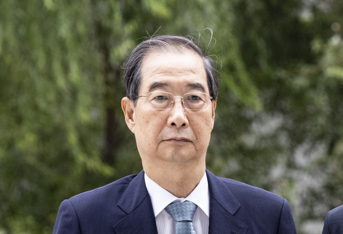 내란 특검이 한덕수 전 국무총리의 첫 번째 공판을 중계해 줄 것을 재판부에 요청했다. 사진은 지난 9일 서울 종로구 김건희 특검팀에 출석 중인 한덕수 전 국무총리의 모습. /사진=뉴시스