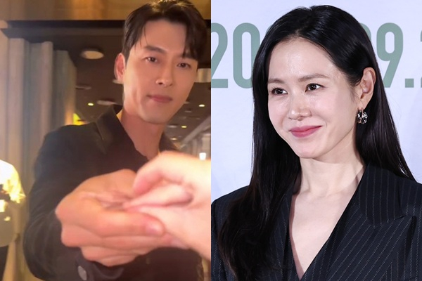 배우 현빈이 VIP 시사회 현장에서 보여준 ‘하트 철벽’ 반응이 화제를 모으고 있다. /사진=온라인커뮤니티, 뉴스1