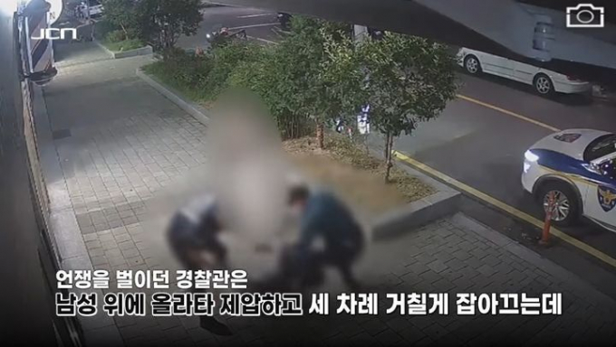 경찰관이 데이트폭력 신고자를 제압, 연행해 과잉체포 논란이 일고 있다. /사진=JCN울산중앙방송 공식 유튜브 채널 '존티비JONTV' 캡처