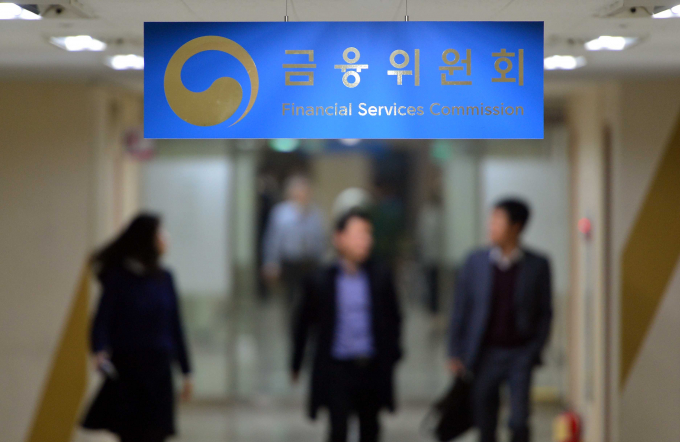 PF시장의 건전성 회복을 현장에선 체감하지 못하고 있다. 금융당국은 자기자본비율 상향을 2027년부터 단계별로 시행할 계획이다. 사진은 금융위원회 전경. /사진=뉴시스